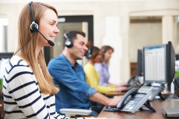 customer service employees happy smiling headset small business phone systems